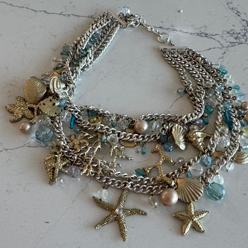 White House Black Market Gold and Silver Ocean Charm Necklace